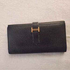 Hermes Black Clutch with Gold Accent